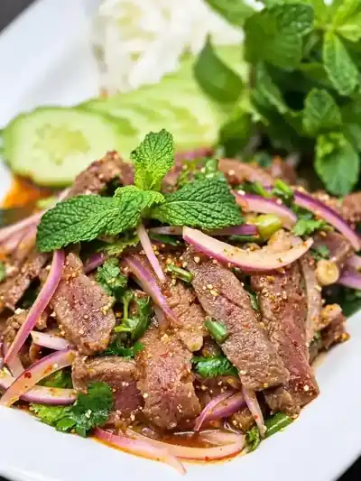 Thai Haven grilled beef salad with herbs and red onion