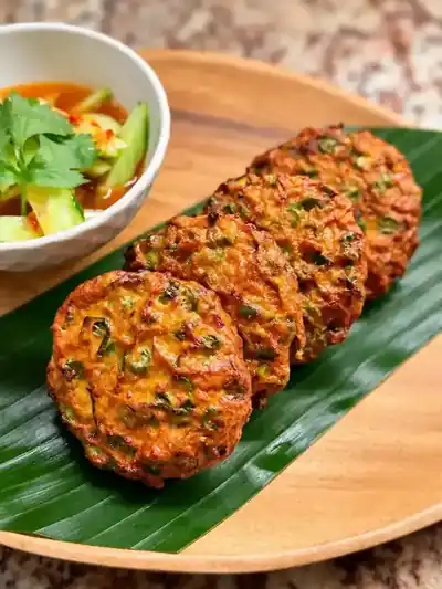 Thai Haven prawn cakes served on banana leaf with cucumber relish